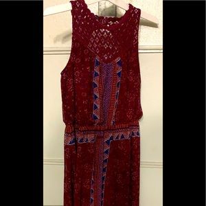 Maroon long pretty dress. Sheer underneath past the knee.